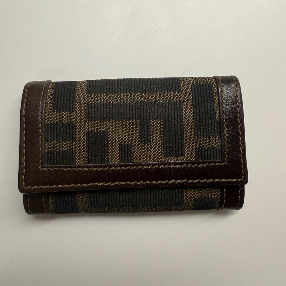 Brown And Black Patterned Wallet - image 1